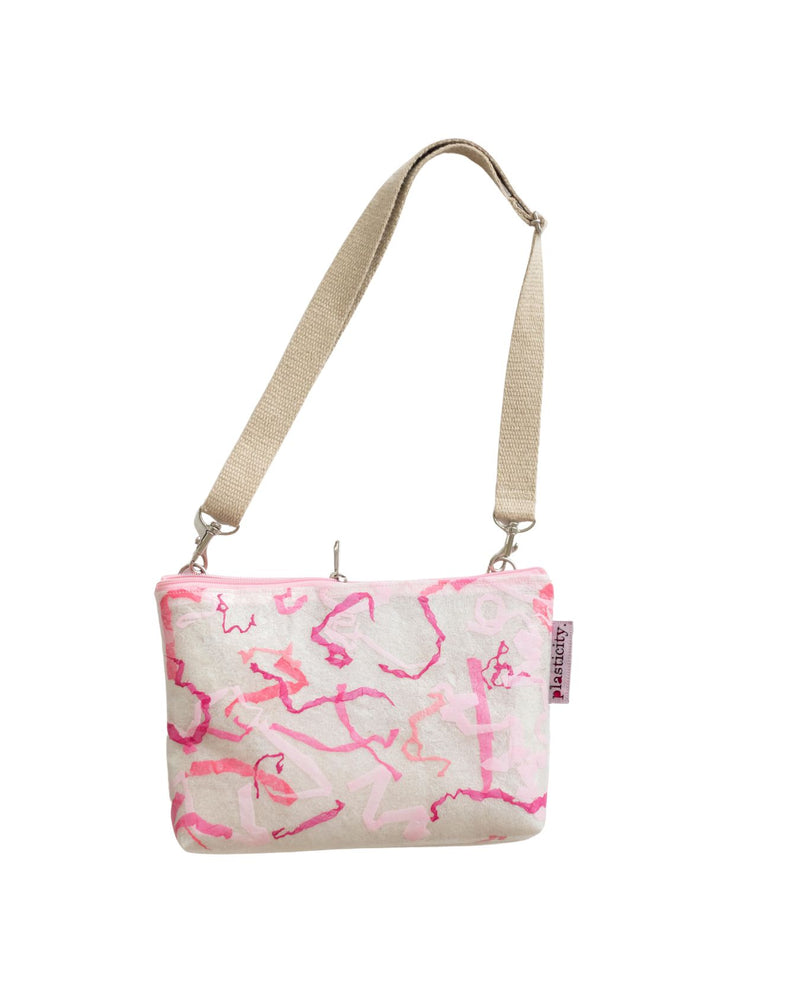 Water-resistant upcycled plastic sling bag | Pink Squiggle