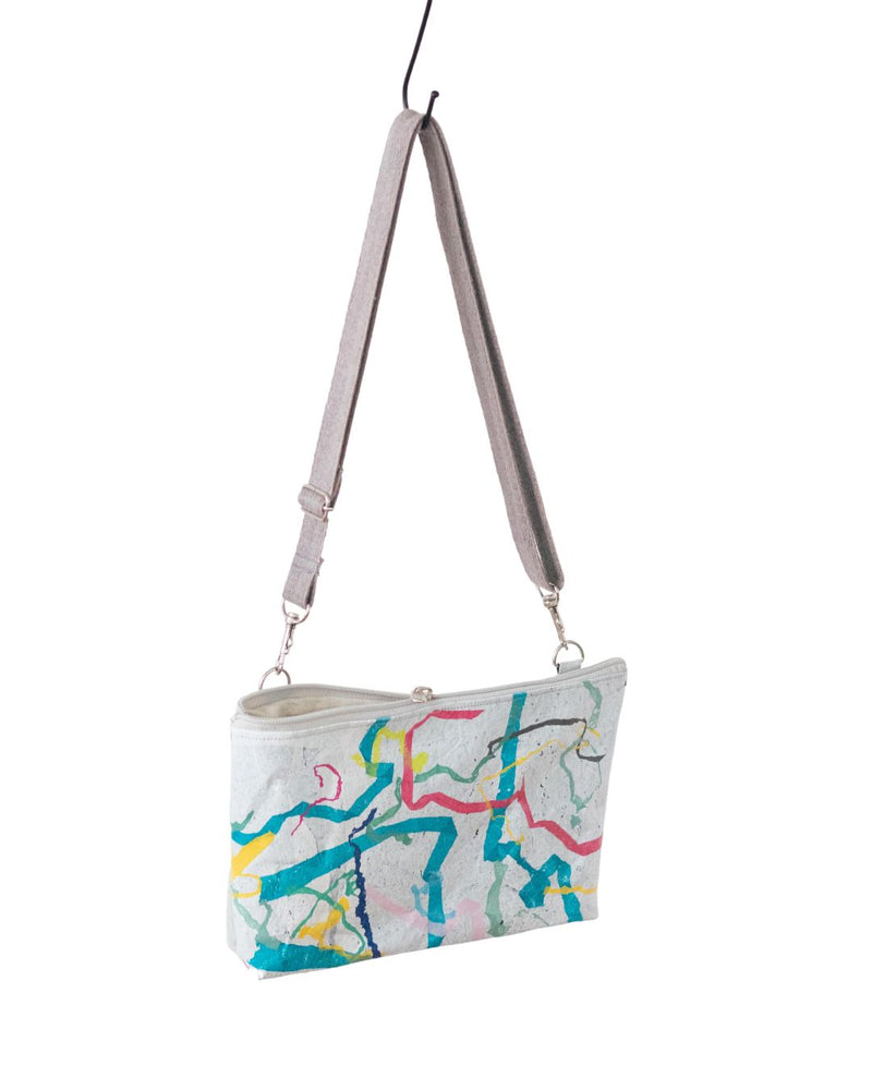 Water-resistant upcycled plastic sling bag | Squiggles