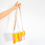 Water-resistant upcycled plastic sling bag | Sunshine